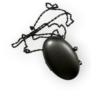 Vintage Bloomingdale’s metal Oval Crossbody egg shaped Clutch with Chain Strap